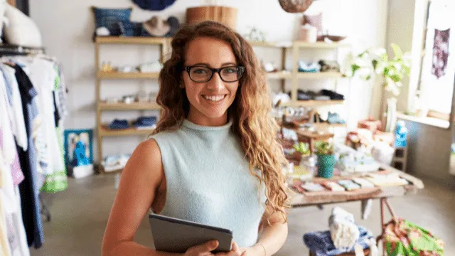 Small business owner using Modern on a tablet in her shop